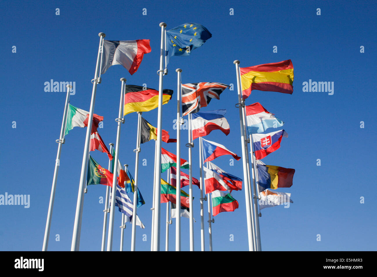 flag poles flying Stock Photo - Alamy