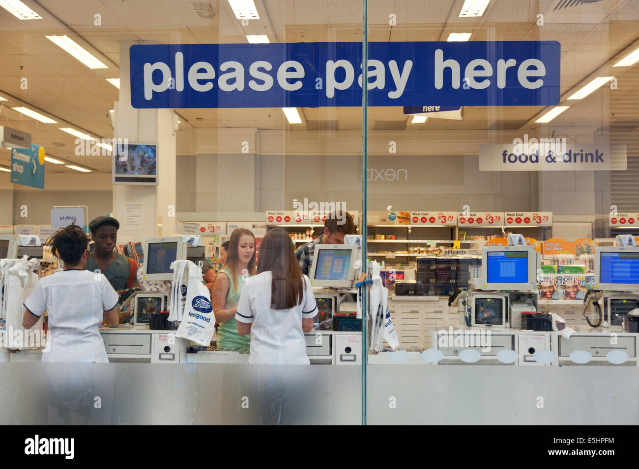 Please Pay here sign in a Supermarket Stock Photo