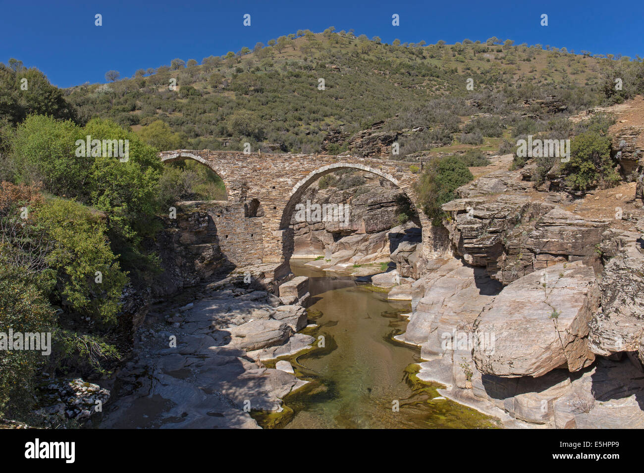 Historical stone bridge over Gediz River Kula Manisa Turkey Stock Photo