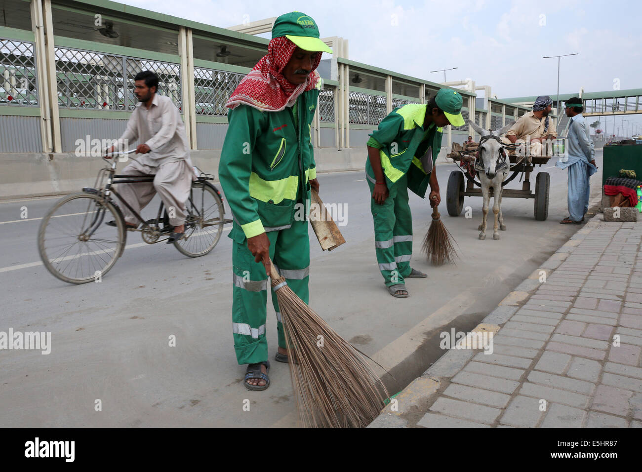 Pakistan, Lahore Road cleaning and waste disposal is done by