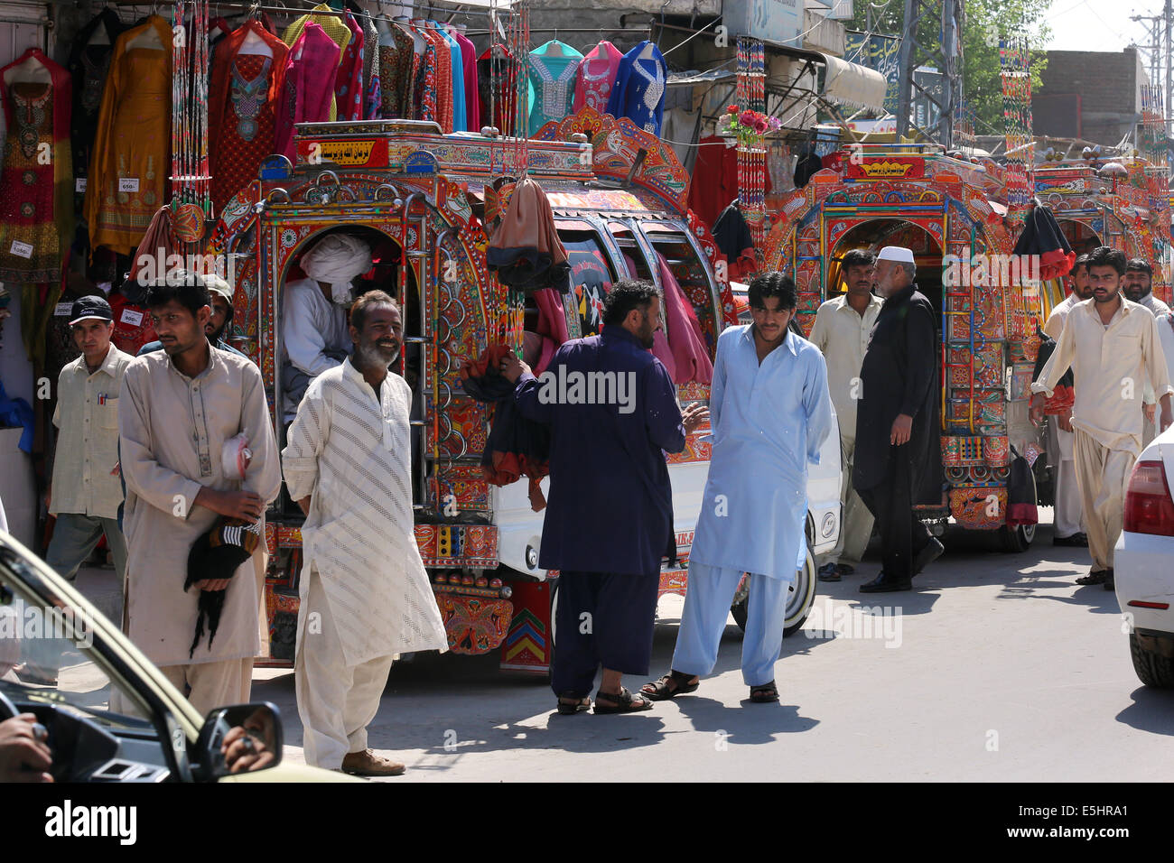 Colorful decorated mini busses, taxi cabs, public transport in Rawalpindi, Pakistan Stock Photo
