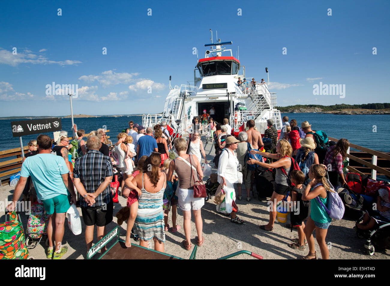 People going to ferry on Koster islands, Sweden Stock Photo