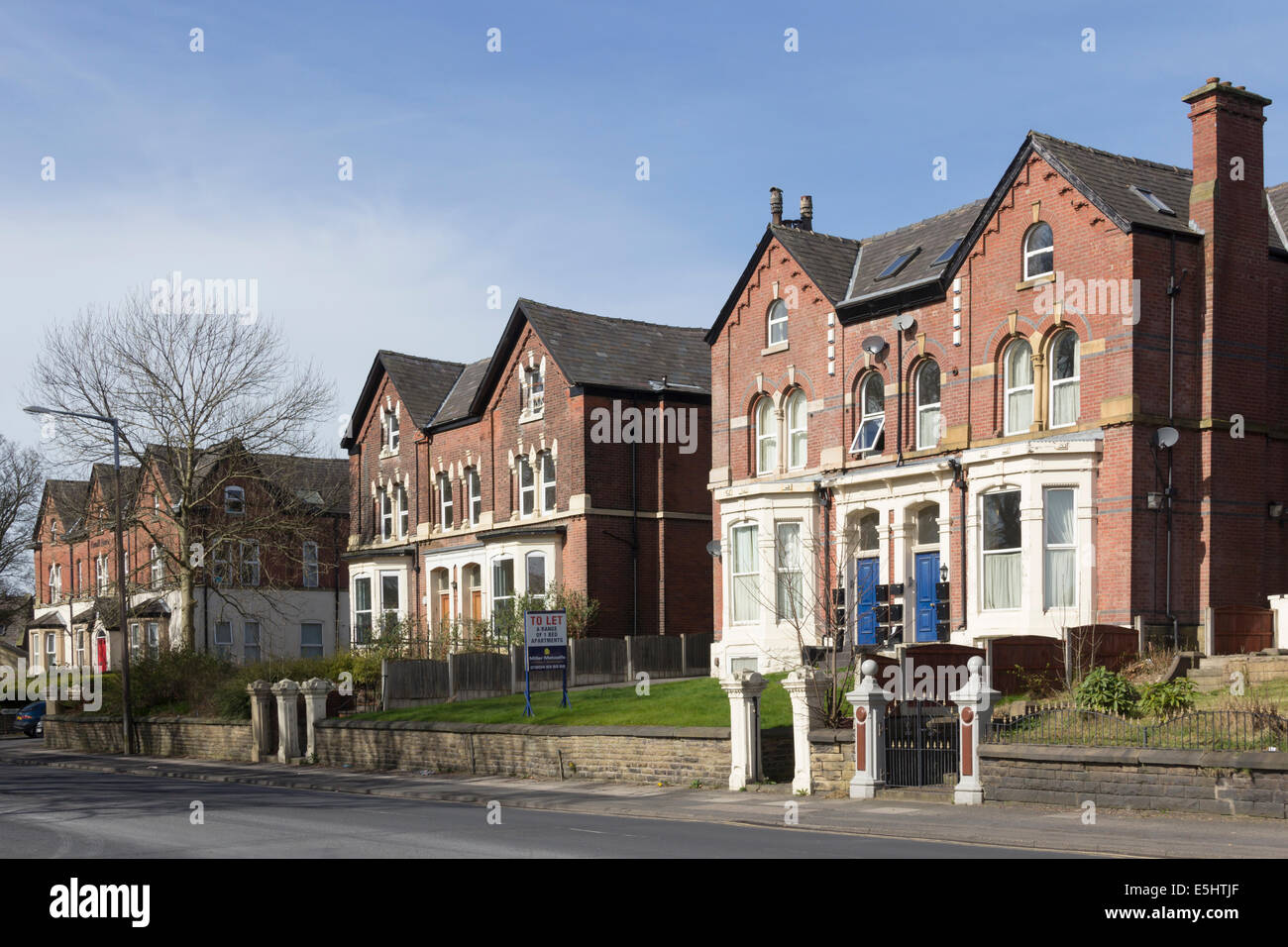 Row of large Victorian semidetached houses on Chorley New Road, Bolton