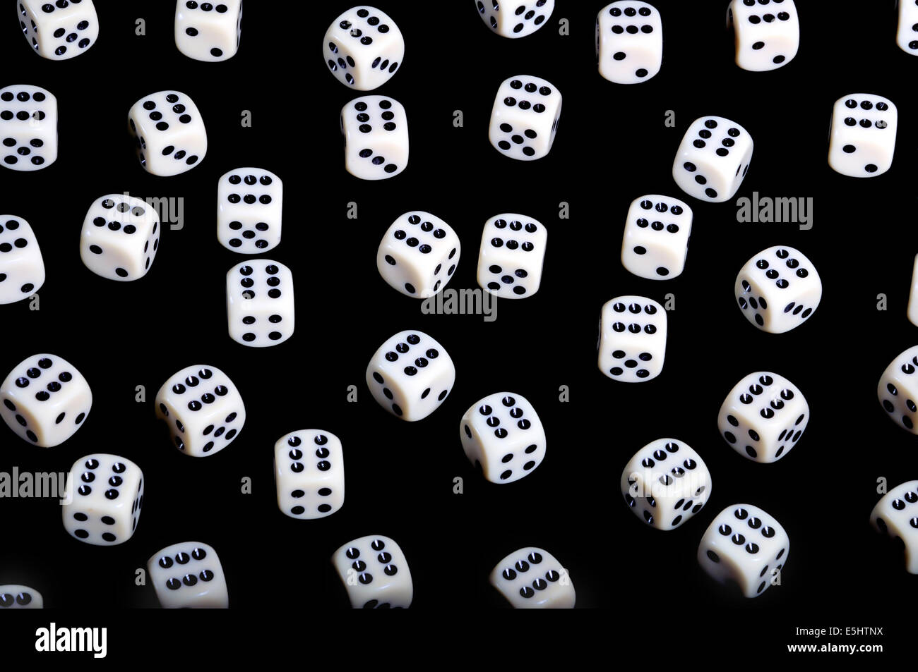 Background of dice with No. 6, isolated on black - gambling concept Stock Photo