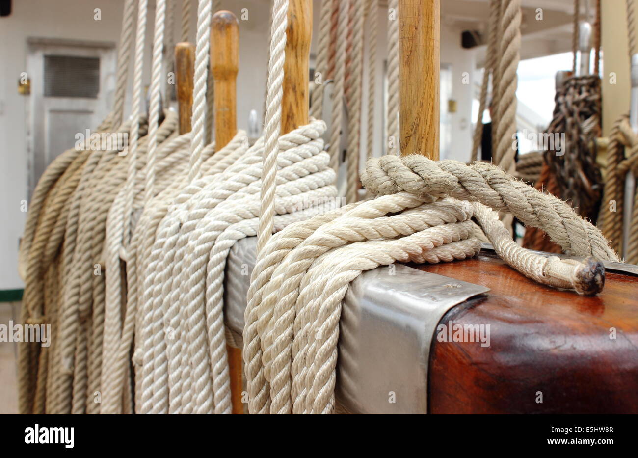 Yachting. Nautical thick ropes, nautical thick cord, rigging details on old  sailboat Stock Photo - Alamy