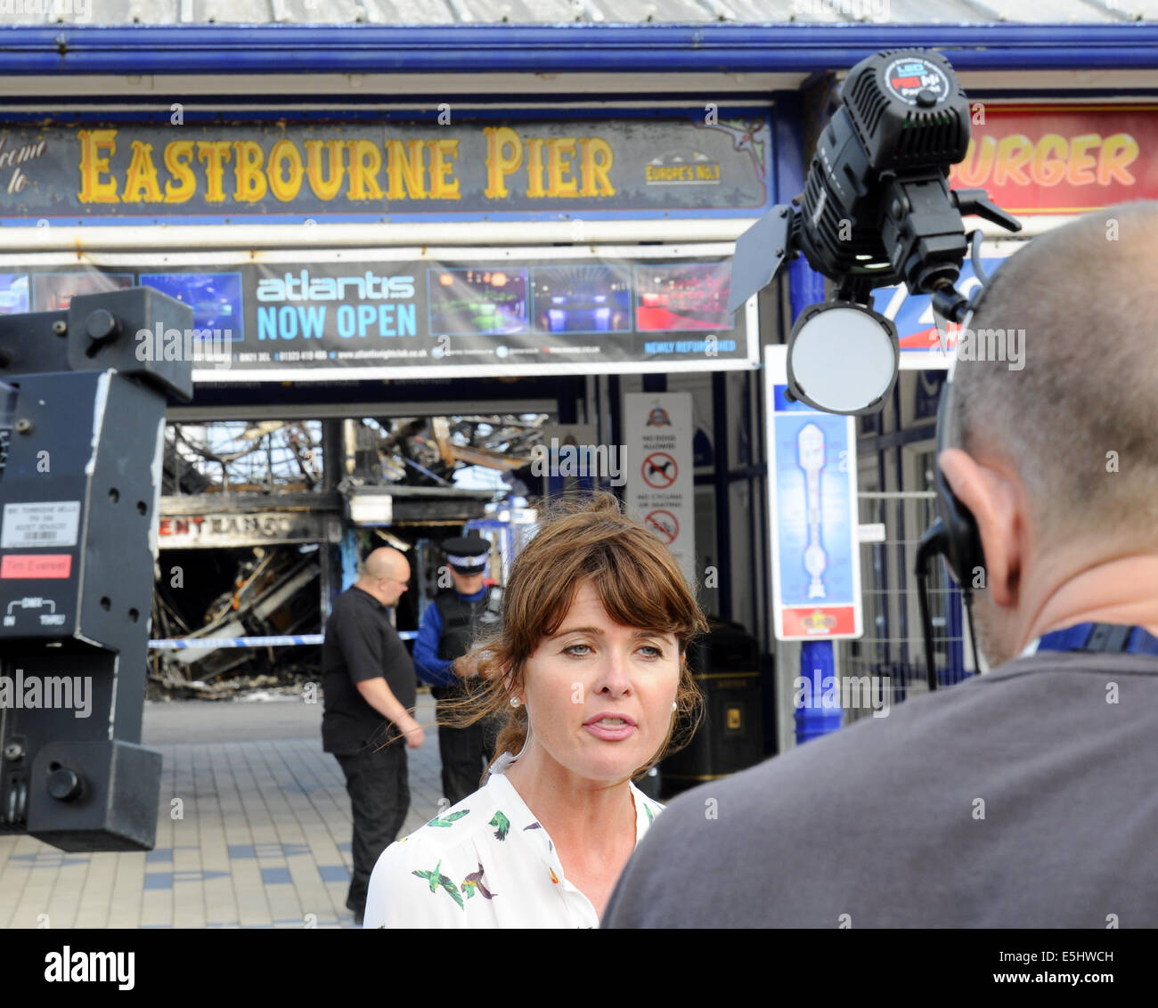 Eastbourne, East Sussex, UK. 1st Aug, 2014. Arson probe is launched by Police following Eastbourn Pier fire. Chrissie Reidy BBC reports. Credit:  David Burr/Alamy Live News Stock Photo