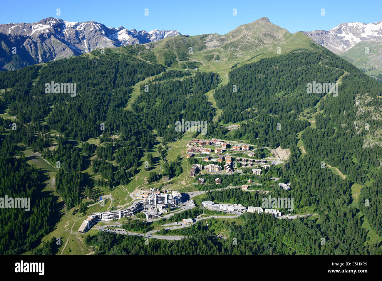 AERIAL VIEW. Ski resort of Puy-Saint-Vincent in the summer. Les Écrins Massif, Hautes-Alpes, France. Stock Photo