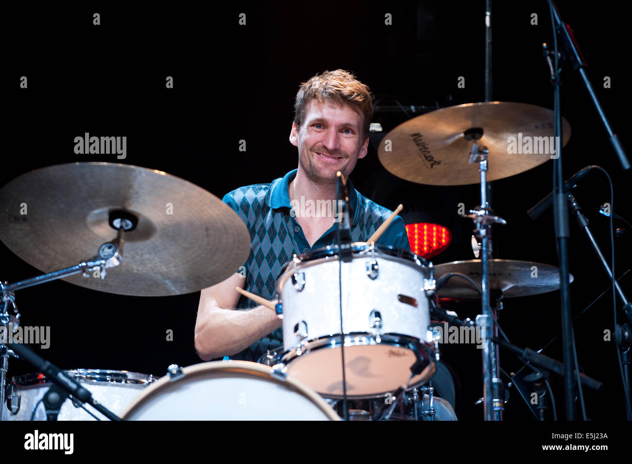 Freiburg, Germany. 1st August, 2014. Nicolai Ziel (drums) from The Island Orchestra (Inselorchester) performs at the ZMF music festival in Freiburg, Germany. Photo: Miroslav Dakov/ Alamy Live News Stock Photo