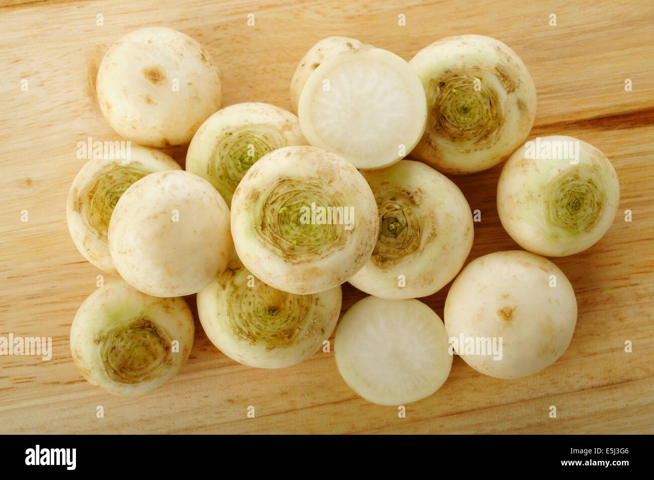 turnip on wooden kitchen board Stock Photo