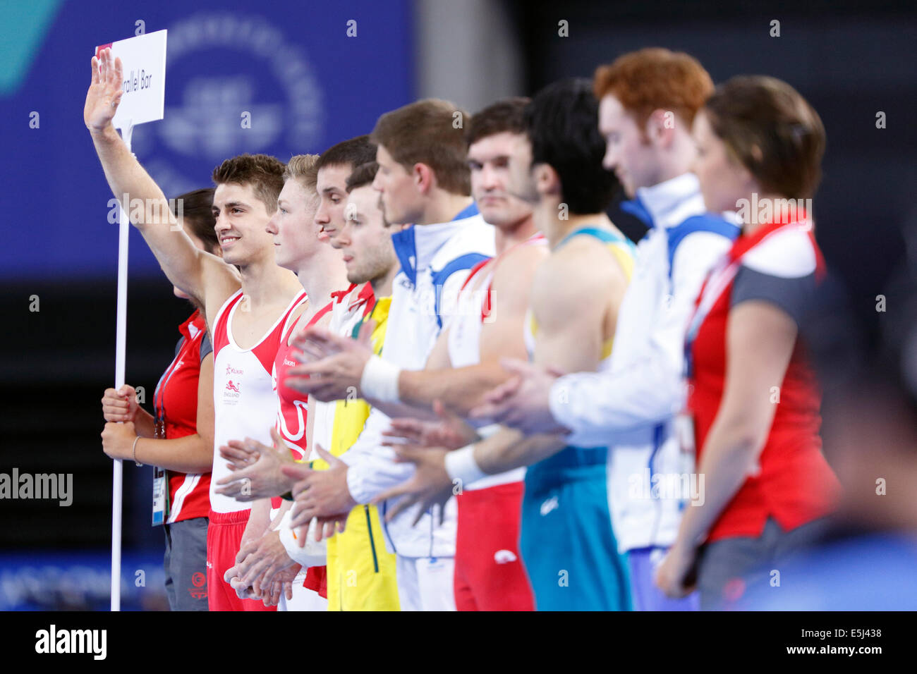 SSE Hydro, Glasgow, Scotland, UK, Friday, 1st August, 2014. Glasgow 2014 Commonwealth Games, Men’s Artistic Gymnastics, Individual Parallel Bars Final. Max Whitlock of England introduced to the spectators at the start of the competition Stock Photo