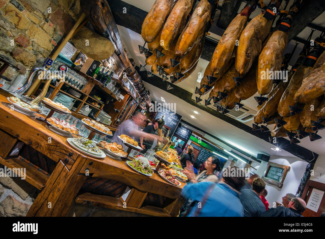 Pinchos or pintxos served in a bar of Donostia San Sebastian, Gipuzkoa, Basque Country, Spain Stock Photo