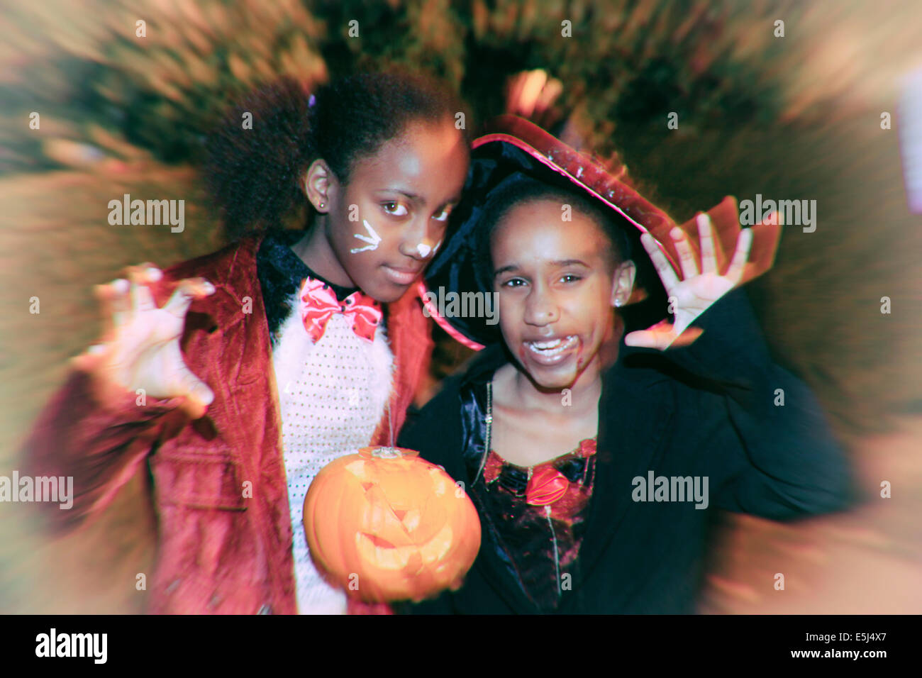 Two black children celebrating Hallowe'een Stock Photo