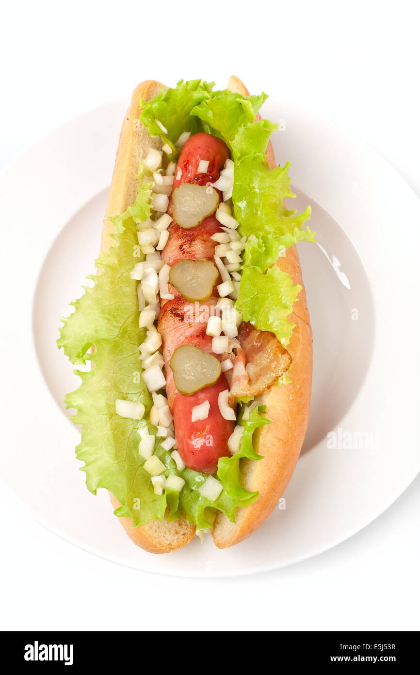 chicago hotdog with lettuce, pickles, onions and bacon Stock Photo