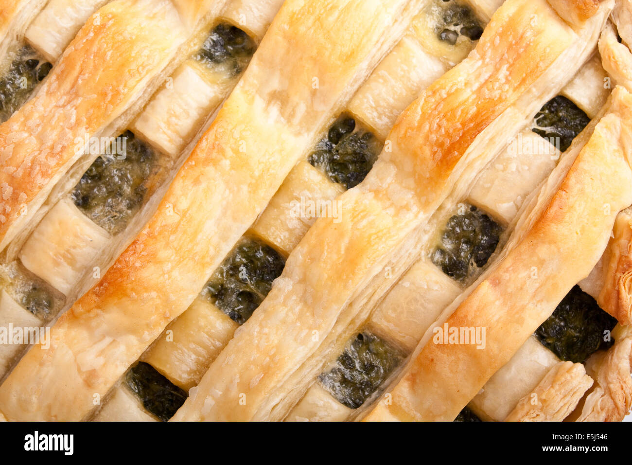 a spinach open pie texture close up Stock Photo - Alamy