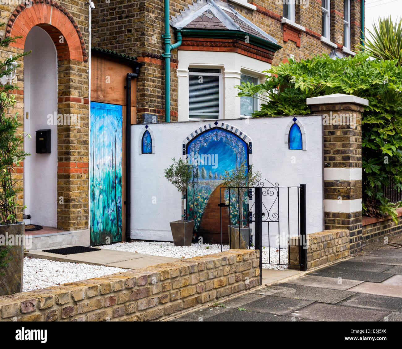 Trompe l'oeil, trompe-l'œil art scene -  artwork at front garden entrance of suburban House Twickenham, London UK Stock Photo