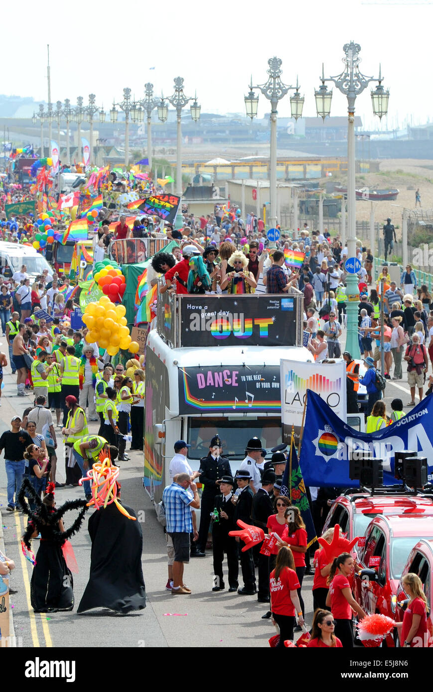 Brighton, Sussex, UK. 2nd Aug, 2014. The procession leaves the seafront as thousands of people take part in the annual Brighton Pride Parade today  Credit:  Simon Dack/Alamy Live News Stock Photo