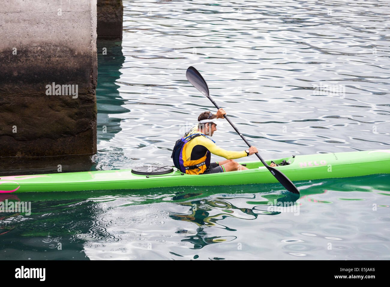 Jacky Boisset launching a Thule kayak at Playa San Juan in Tenerife, Canary  Islands, spain Stock Photo - Alamy