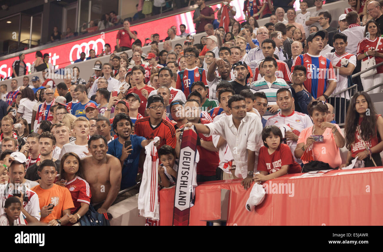 Harrison, NJ - JULY 31, 2014: Fans of FC Bayern Munich celebrate their team winning friendly match against CD Guadalajara Chivas Stock Photo