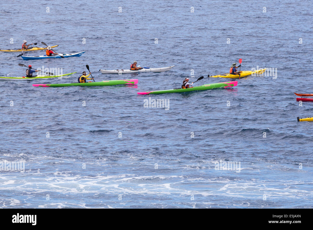 Tenerife, Canary Islands, Spain. 2nd Aug, 2014. Myriam Guillot and Jacky Boisset. World champion adventure racers take part in the 4th annual kayak race from Playa San Juan, to Los Gigantes and back. The race is an event in the programme of the village's annual fiesta in honor of San Juan Bautista and Nuestra Senora del Carmen. Tenerife, Canary Islands, Spain. Credit:  Phil Crean A/Alamy Live News Stock Photo
