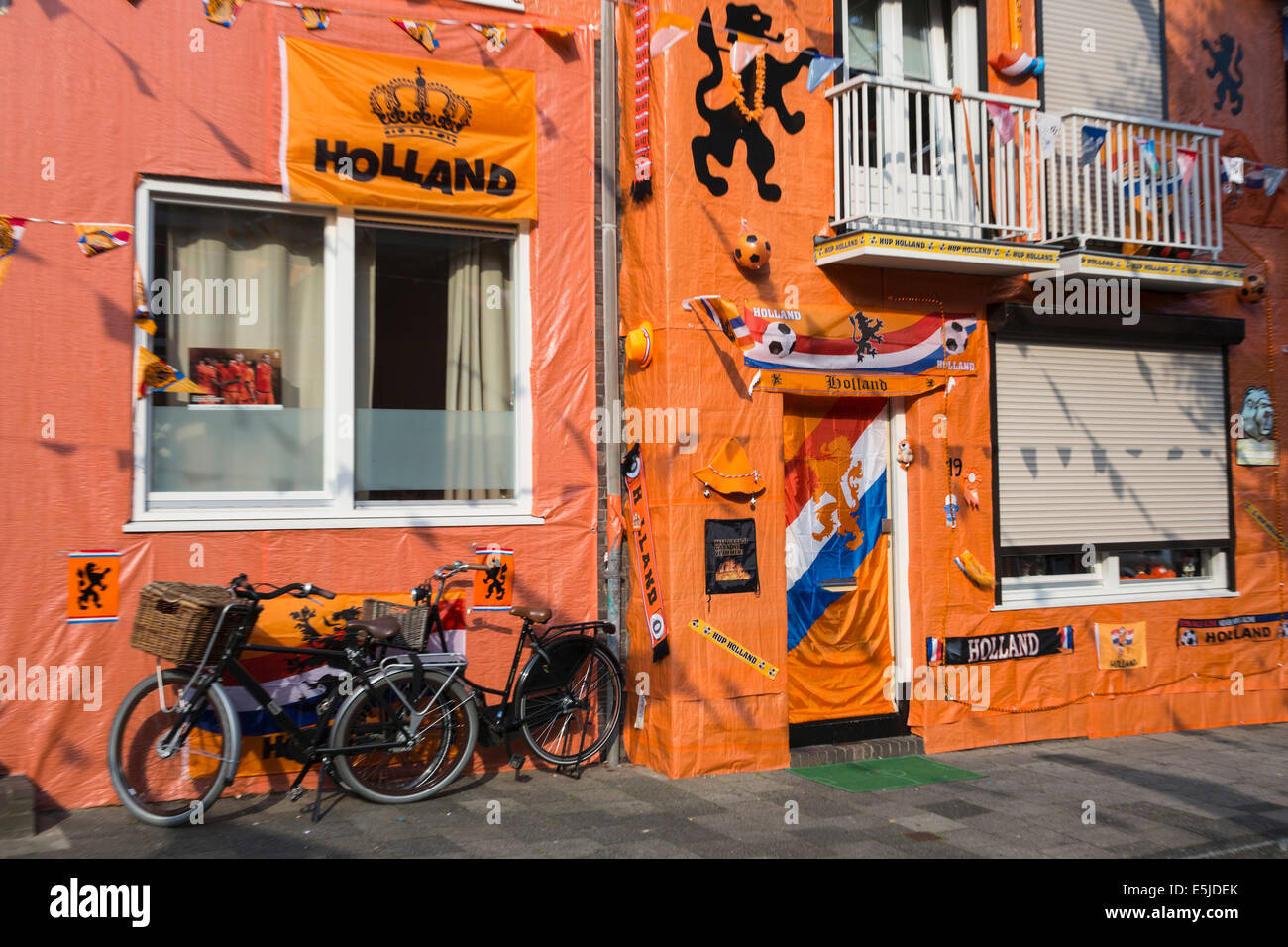 Netherlands, Maastricht, Orange decorated street called Hyacintenstraat. National colors, World Cup Football 2014. Stock Photo