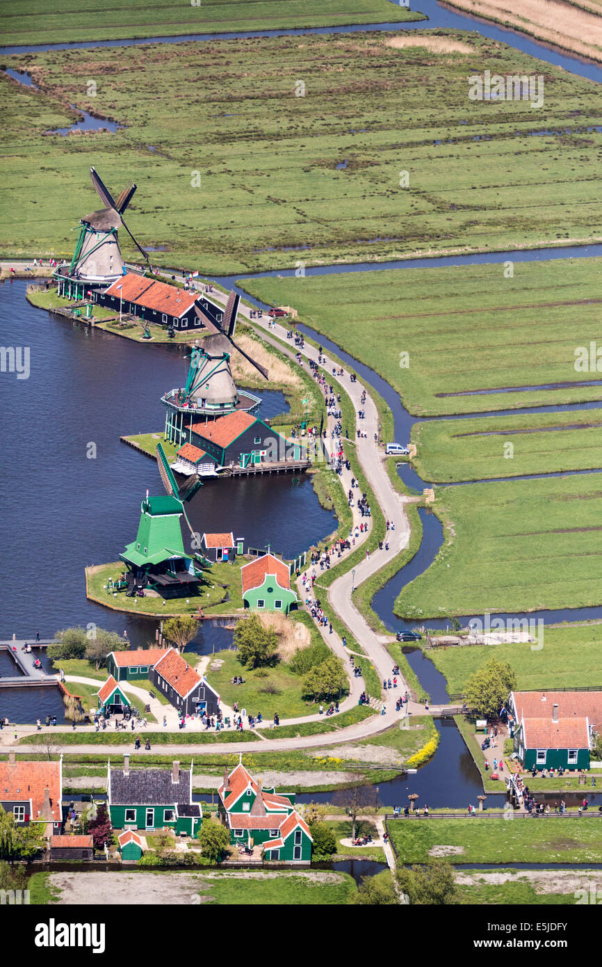 The Netherlands, Zaanse Schans. The outdoor museum has a collection of well-preserved historic windmills and houses. Aerial Stock Photo