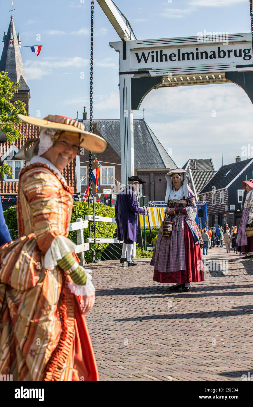Netherlands, Marken, People dressed in costume from 18th Century from area called Zaanstreek Stock Photo