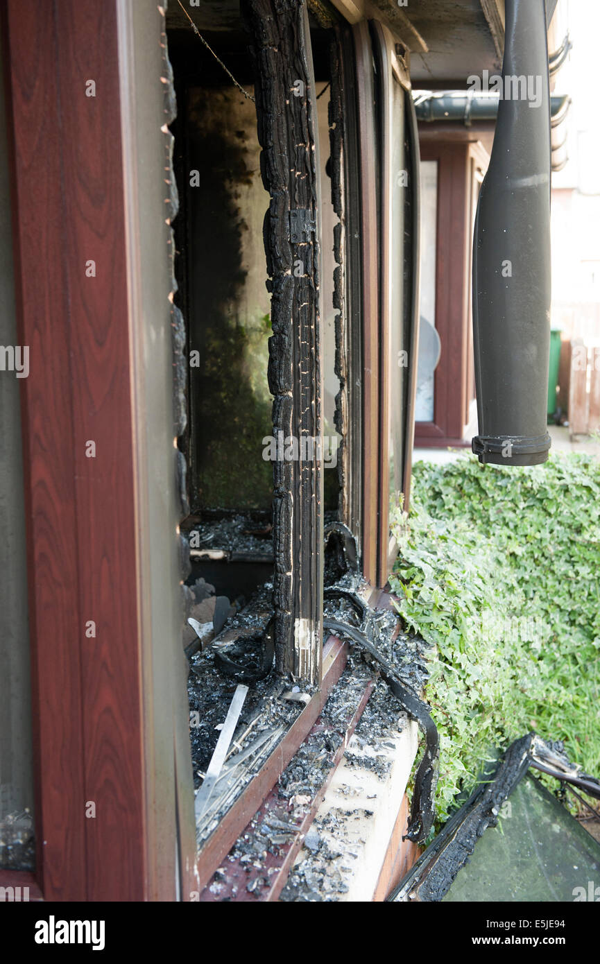 Severe house fire lounge window burnt Rescue Melt Stock Photo