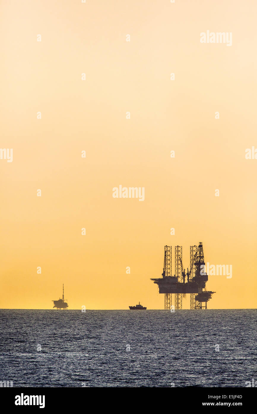 Netherlands, Den Helder, Dutch economic zone on North Sea. Gas drilling platform or rig, supply boat and gas production platform Stock Photo
