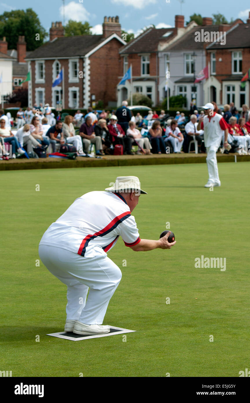 Victoria Park, Leamington Spa, Warwickshire, UK. 02nd Aug, 2014. The 2014 Bowls England National Championships and National Competition Finals for both men and women are being held over a period of 28 days between the 2nd and 31st August. A bowler from the Hampshire county team bowls in the final of the Middleton Cup against Norfolk. Credit:  Colin Underhill/Alamy Live News Stock Photo