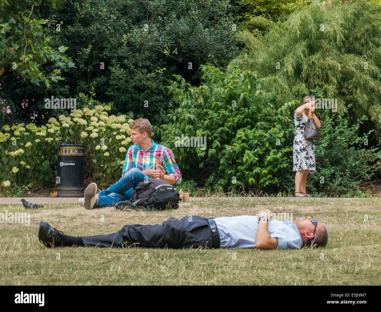 UK Weather: Londoners continue to feel the summer heat into August Stock Photo