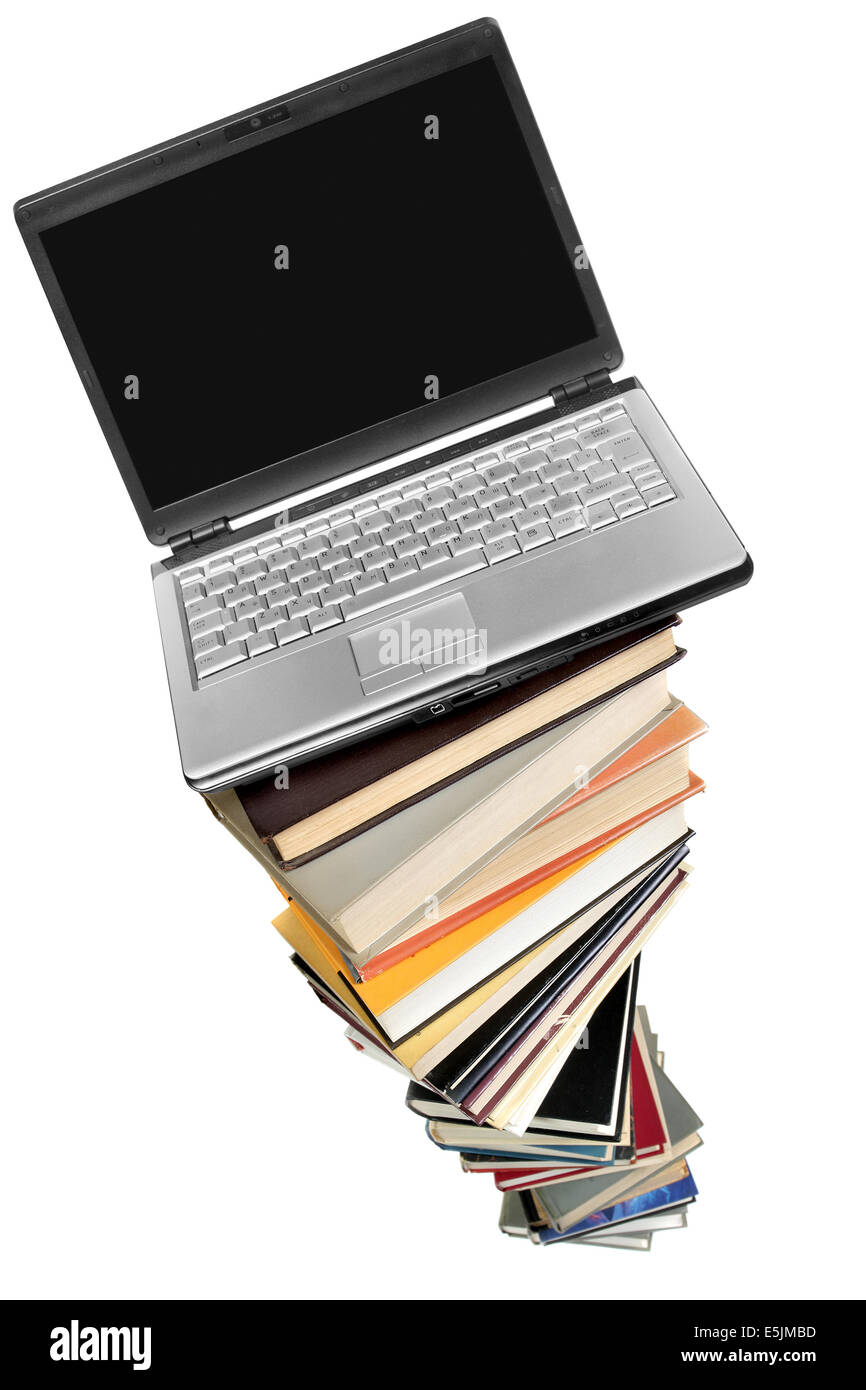 Laptop over books stack isolated over white background Stock Photo