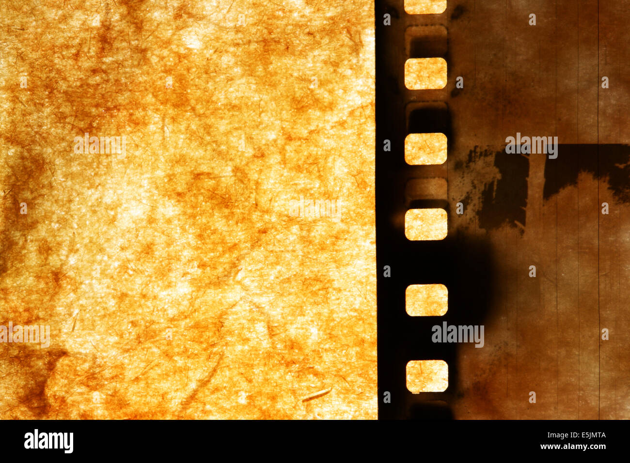 Old film strip over grunge paper background Stock Photo