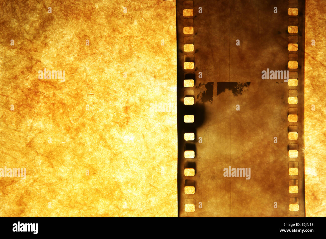 Old film strip over grunge paper background Stock Photo