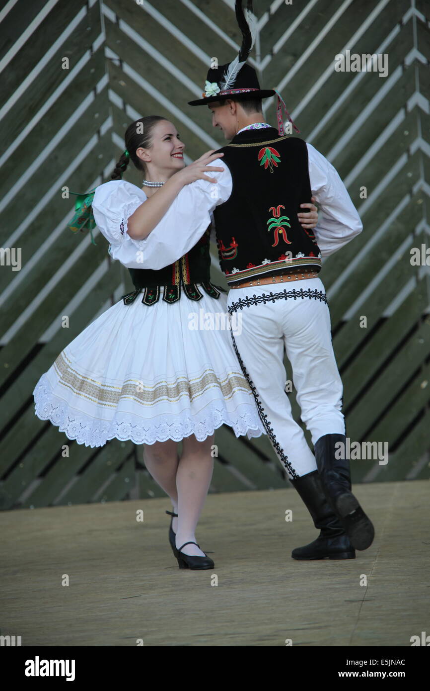 A couple from Slovak folklore ensemble Jurošík from Michalovce (Zemplin province) dancing at Cassovia folklore festival. Stock Photo