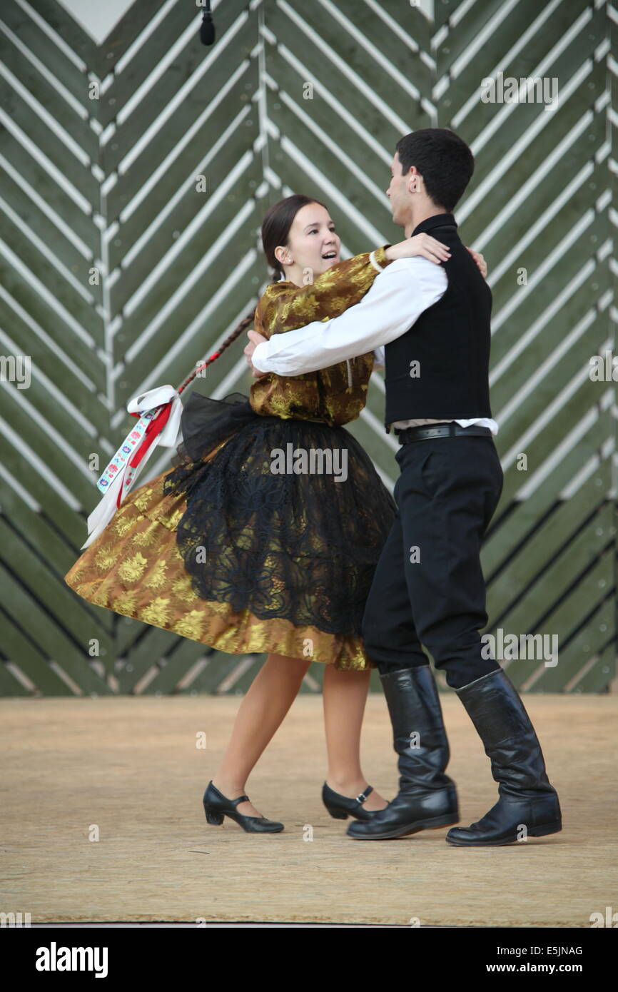 A couple from folklore ensemble Rozmaring - Neptancegyuttes dancing at Cassovia international folklore festival. Stock Photo