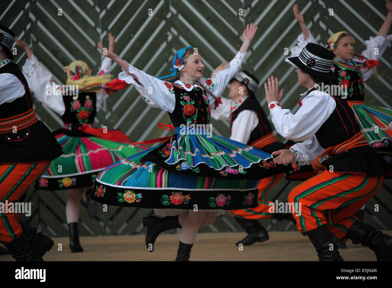 Polish folklore ensemble LESZCZYNIACY from Swidnik (Lublin Province) dancing at Cassovia folklore festival in Kosice, Slovakia. Stock Photo