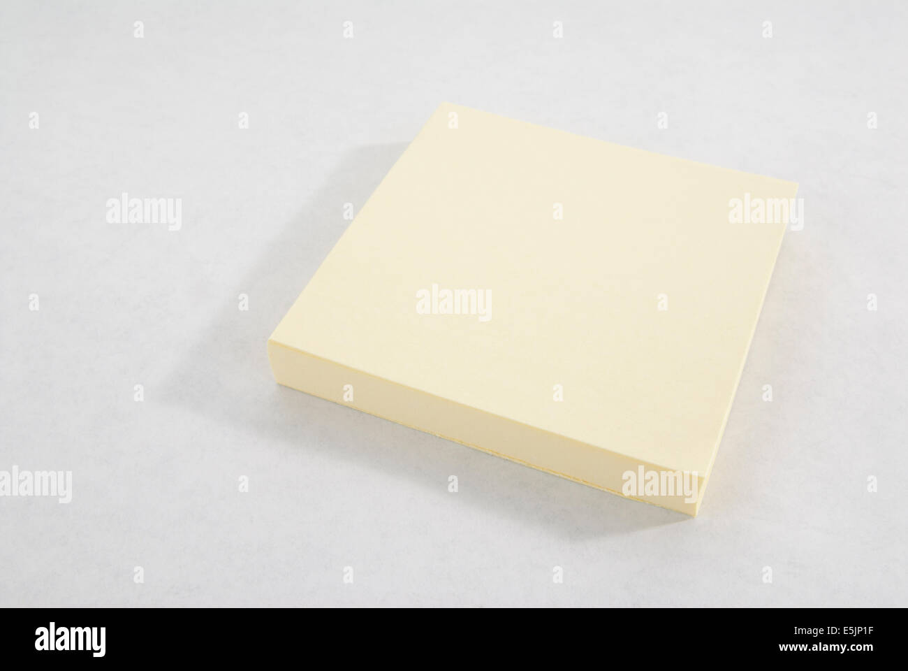 Blank yellow sticky-note pad on a white background Stock Photo - Alamy