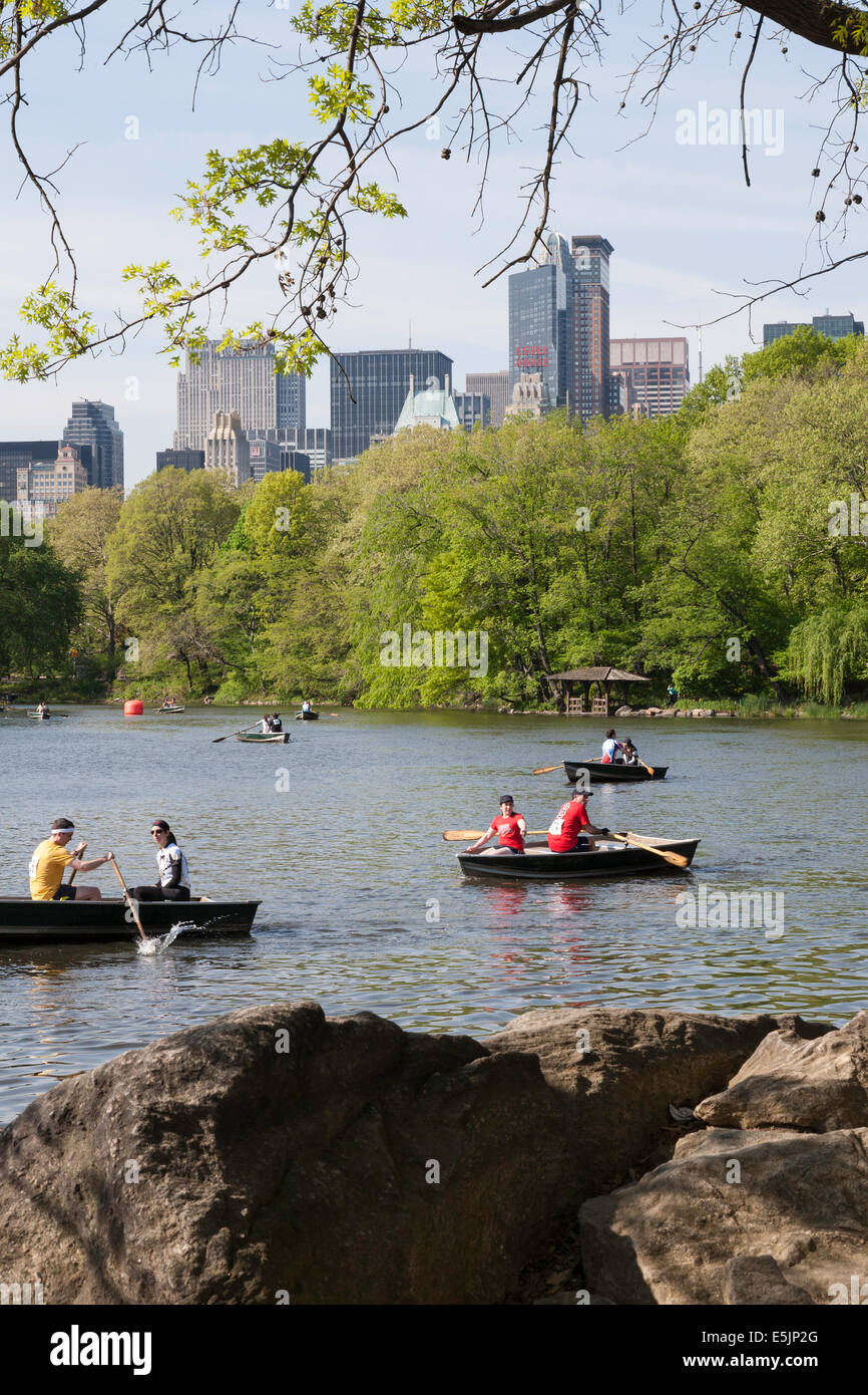 Rowboats in The Lake with Midtown Skyline, Central Park, NYC Stock