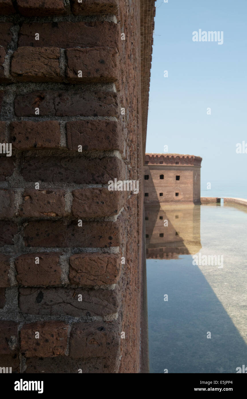 Civil War era Fort Jefferson stands three stories tall over the surrounding 70 miles of ocean at Dry Tortugas National Park. Stock Photo