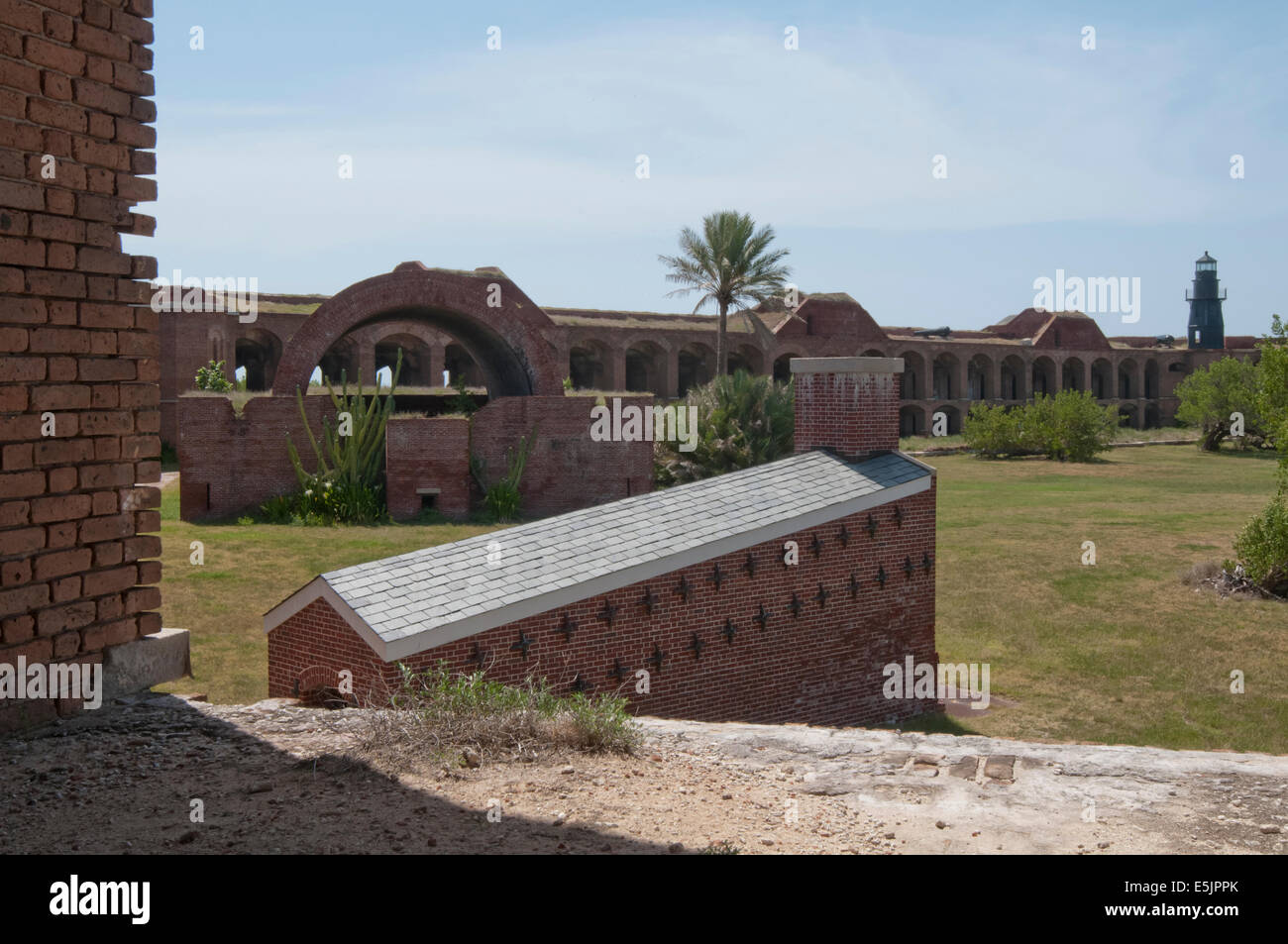 Civil War era Fort Jefferson is home to beautiful masonry, cannons, and the Garden Key lighthouse. Stock Photo