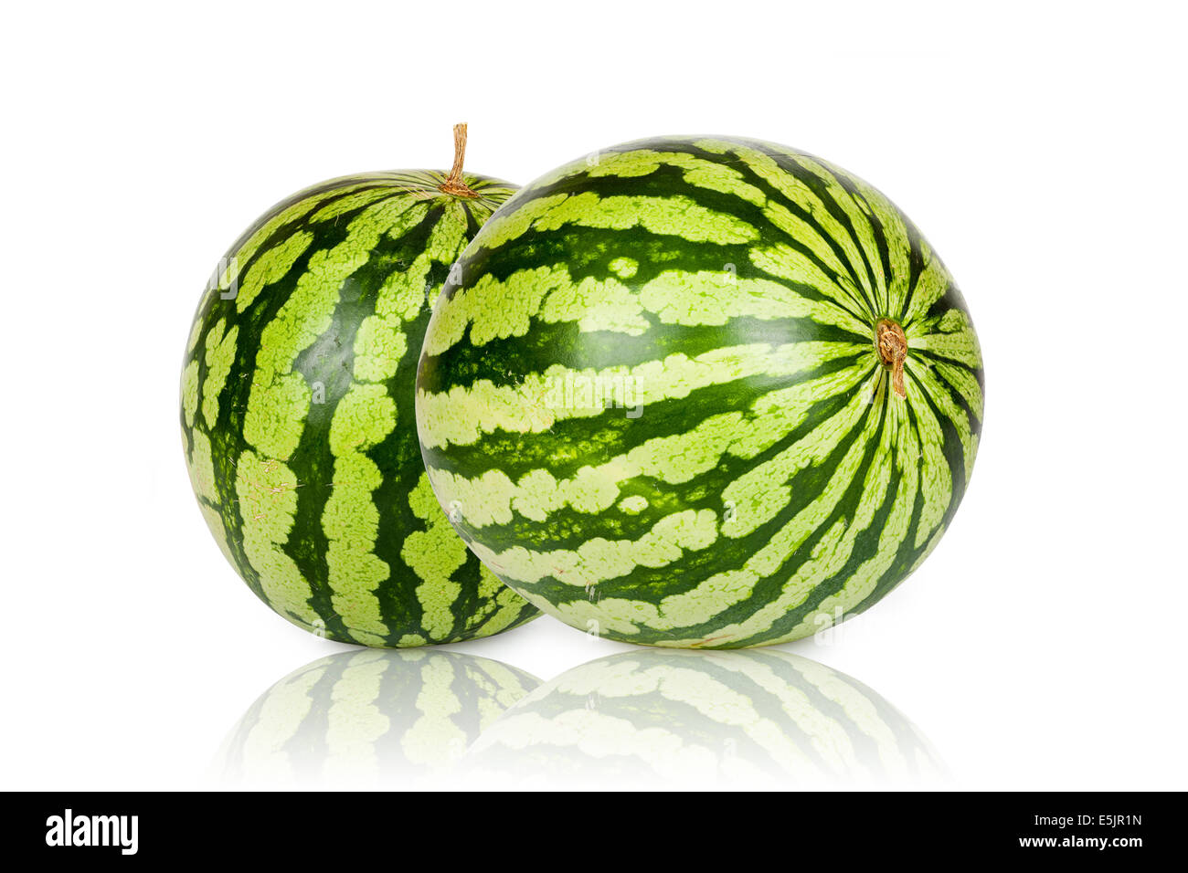 Two green and fresh Watermelons isolated and mirrored on white