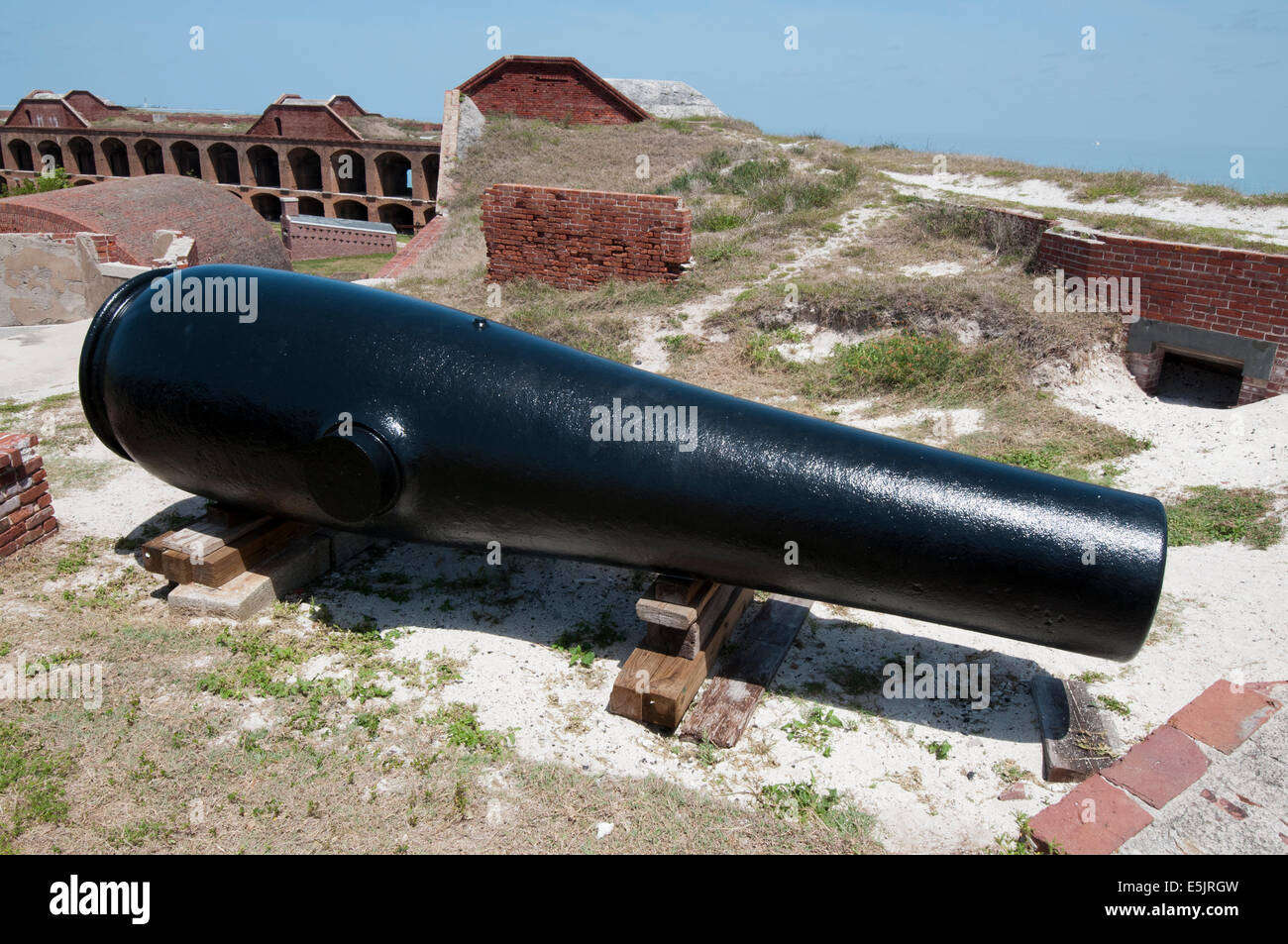 Civil War era Fort Jefferson is home to ten of the few remaining 15 inch, 25 ton smoothbore Rodman cannons, and Garden Key light Stock Photo
