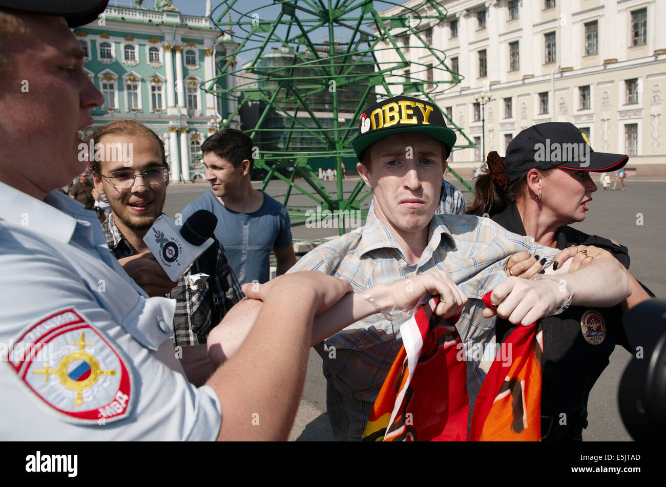 St Petersburg, Russia. 2nd Aug, 2014. LGBT gay activist KIRILL KALUGIN is arrested by police during a one-man protest in Palace Square. Credit:  Denis Tarasov/ZUMA Wire/ZUMAPRESS.com/Alamy Live News Stock Photo
