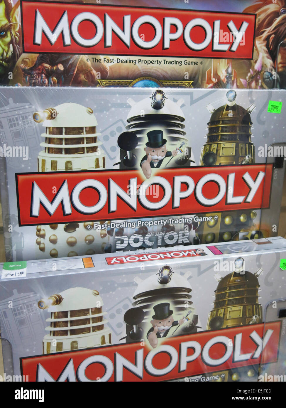 Stars Wars Monopoly Game Sets with Game Mascot Rich Uncle Pennybags, Midtown Comics Store, Times Square, NYC, USA Stock Photo