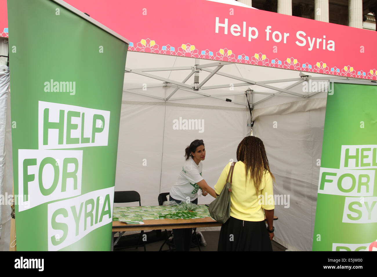 London, UK 2 August 2014.  The Help for Syria stall at Trafalgar Square.The Eid Festival event sponsored by the Mayor of London and partnered by Lebara mobile, Zee Entertainment, Malaysia Kitchen amongst others. Stock Photo