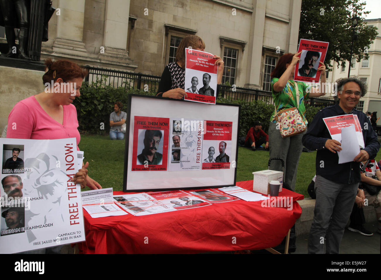 London, UK 2 August 2014. Campaigners demanding the release of jailed Iranian Union workers Reza Shahabi, Behnam Ebrahimzadeh and Shahrokh Zamani. Credit: David Mbiyu/ Alamy Live News Stock Photo