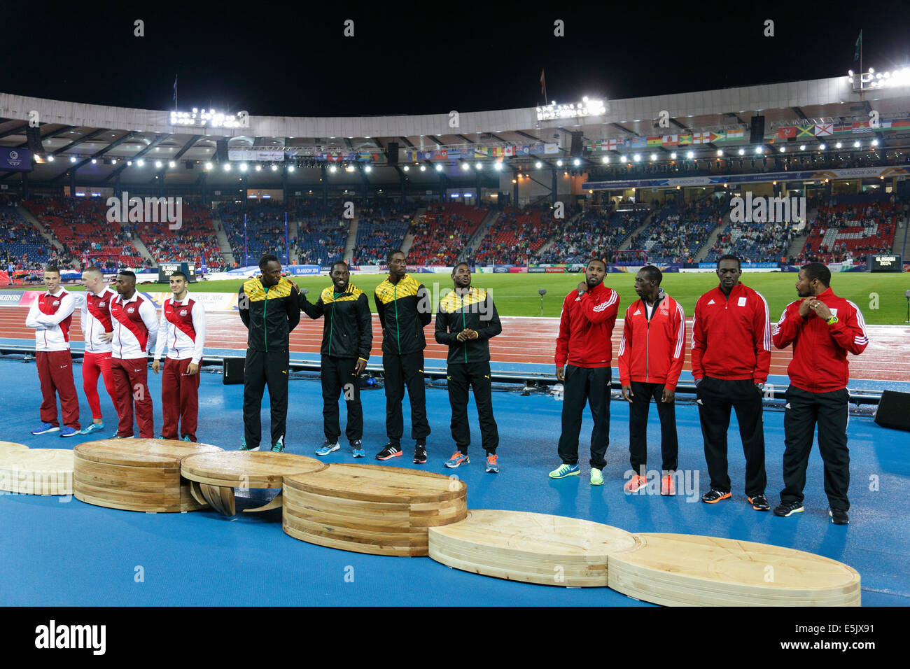 Hampden Park, Glasgow, Scotland, UK, Saturday, 2nd August, 2014. Glasgow 2014 Commonwealth Games, Men's 4 x 100m Relay, Medal Ceremony. Left to Right. England Silver, Jamaica Gold, Trinidad and Tobago Bronze Stock Photo