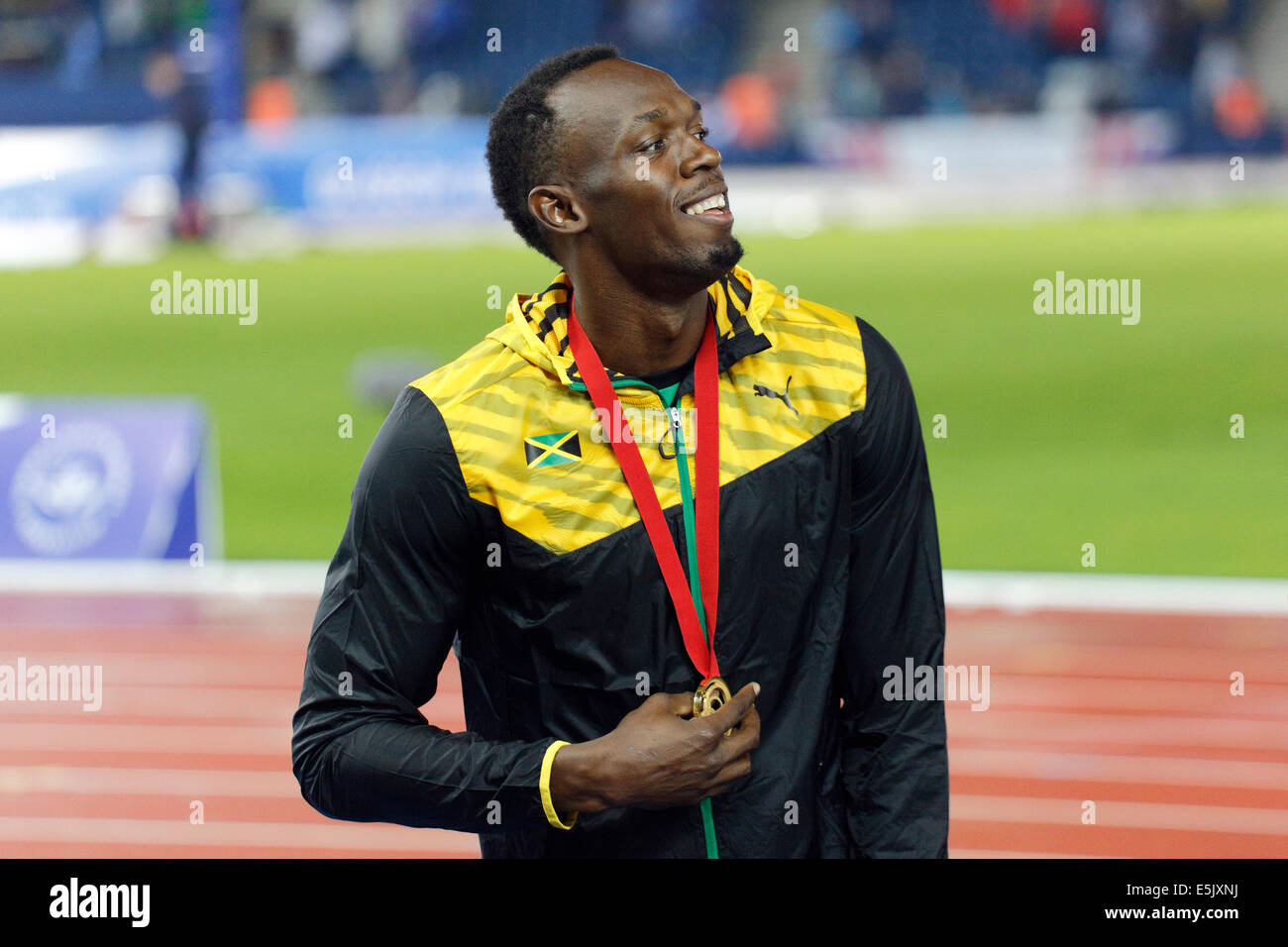 Hampden Park, Glasgow, Scotland, UK, Saturday, 2nd August, 2014. Glasgow 2014 Commonwealth Games, Men's 4 x 100m Relay, Medal Ceremony. Usain Bolt, Jamaica, Gold Stock Photo