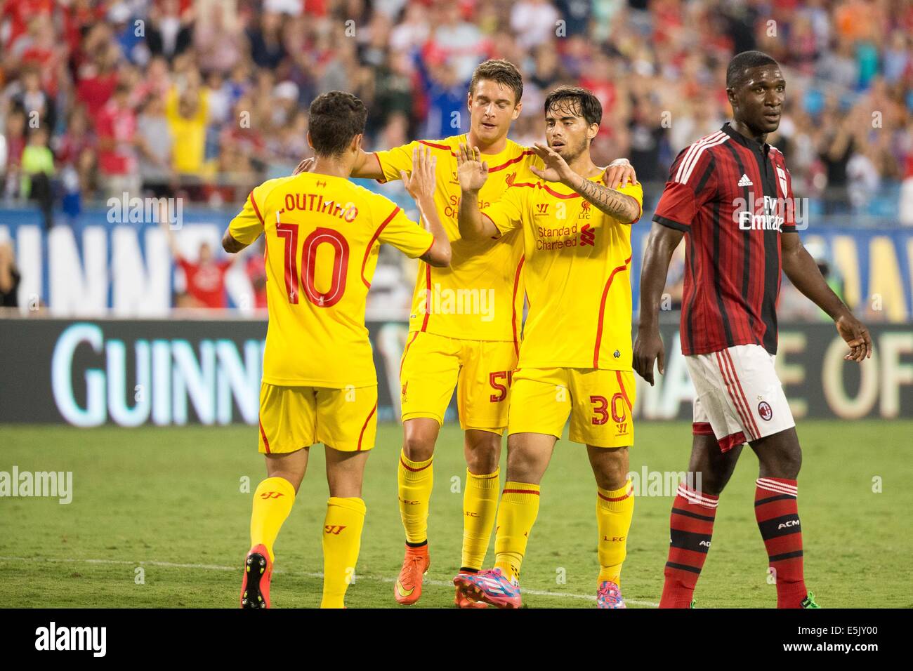 Charlotte, North Carolina, USA. 2nd Aug, 2014. Liverpool Forward JESUS FERNANDEZ SAEZ SUSO (30) celebrates with teammates after scoring during the 2014 Guinness International Champions Cup match between AC Milan and Liverpool at Bank of America Stadium in Charlotte, NC. Liverpool goes on to win 2 to 0. Credit:  Jason Walle/ZUMA Wire/Alamy Live News Stock Photo