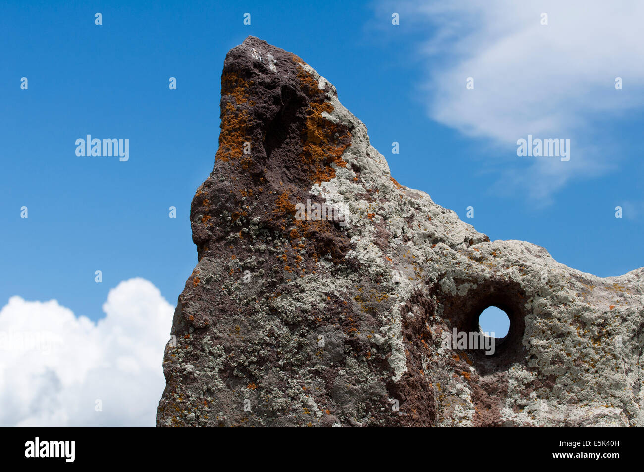 Hole on megalith, Zorats Karer (Karahunj) prehistoric archaeological site, Armenia Stock Photo